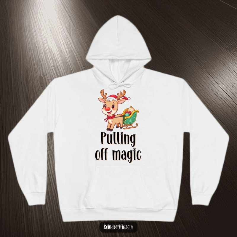 Funny hoodie depicting a happy, smiling reindeer energetically pulling a small, sparkling sleigh, perfect for winter fun.