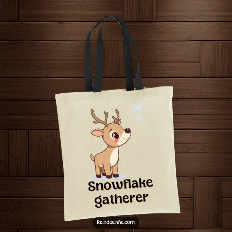 Funny tote bag with a curious reindeer tilting its head to observe a single falling snowflake, perfect for winter.
